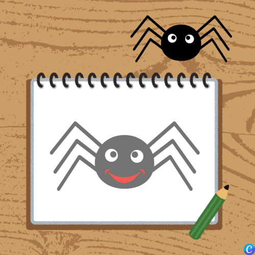 Image d'un cahier où se trouve dessiné une arraignée avec un sourire et une arraignée au-dessus, posée sur le bureau